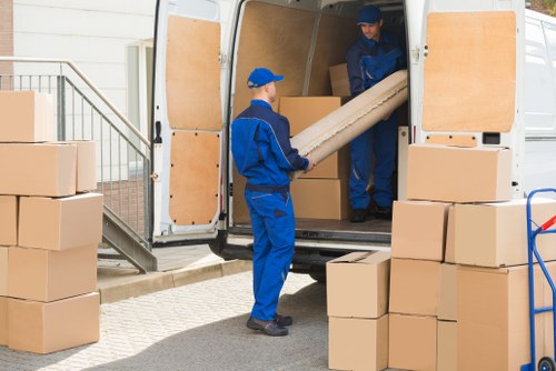 Removal Company Hampstead vehicle with recyclable items being loaded responsibly