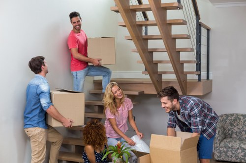 Hampstead apartment relocation with boxes and furniture ready for moving day