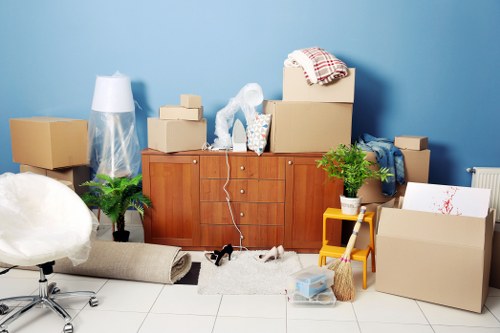 Removal team preparing furniture and boxes for a home move