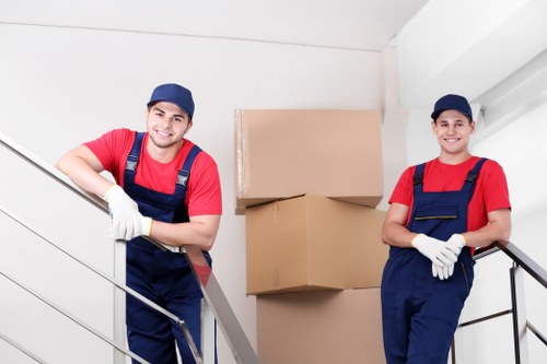 Packing and loading furniture into a moving truck in Hampstead