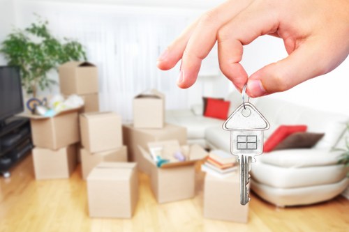 Professional movers handling furniture for a Hampstead home or office