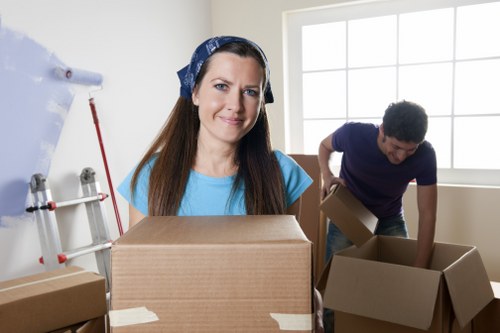 Moving company staff loading items for a Hampstead relocation