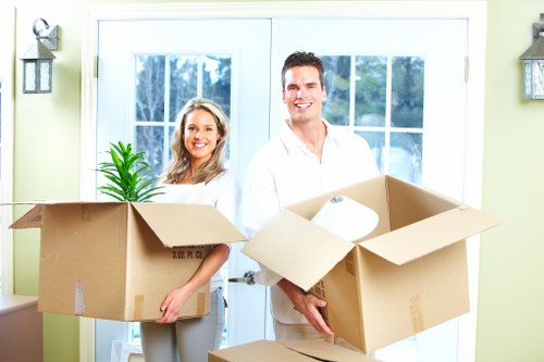 Safety-focused movers assessing access before loading