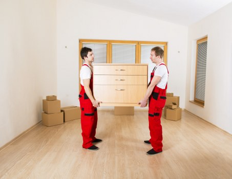 Packed office equipment prepared for a Hampstead business move